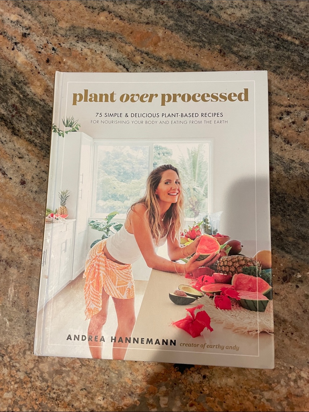 Plant over processed book